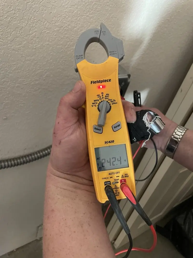 Voltage testing with clamp meter during Generator Installation in Alamo